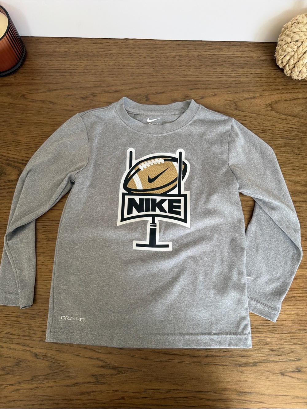 Kids Nike Gray Long Sleeve Tee Dri fit with Football Goalpost Graphic